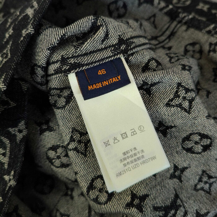 Etichetta Louis Vuitton Made in Italy, taglia 46, dettagli di stile e qualità luxury.