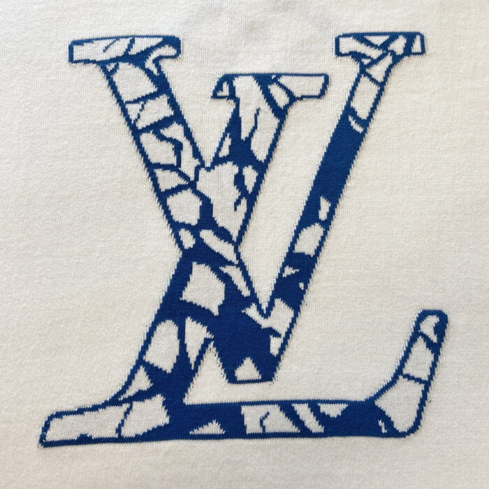Logo di lusso blu con effetto marmo crackle e design elegante.