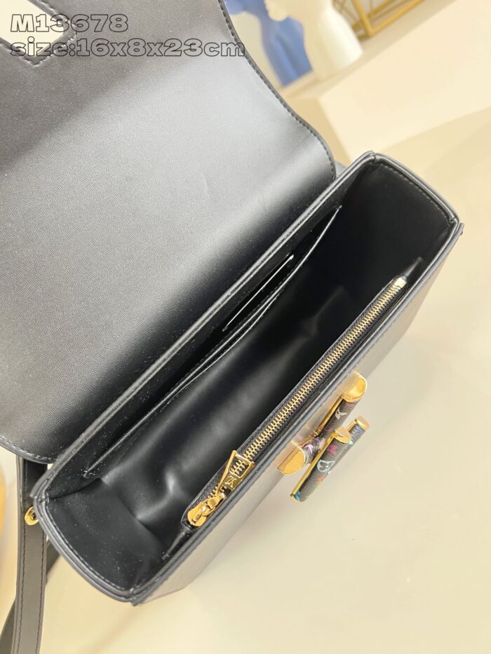 Borsa femminile nera elegante con scomparto interno con zip e design pratico e raffinato.