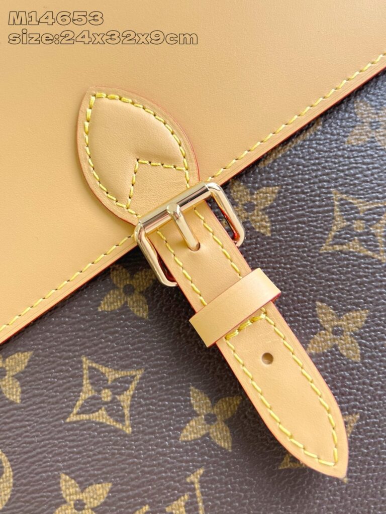Borsa di lusso in pelle e tessuto con fibbia elegante e dettagli raffinati.