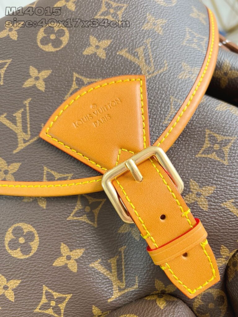 Dettaglio tracolla Louis Vuitton in Monogram Canvas con fibbia in metallo e dettaglio in pelle arancione