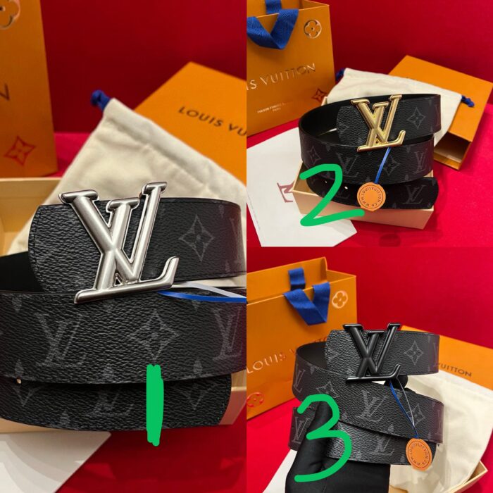 Cintura Louis Vuitton in pelle nera con fibbia doro e argento, eleganza e stile di lusso.