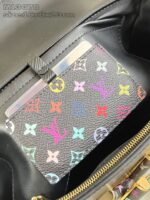 Portafoglio Louis Vuitton Multicolore dentro borsa di lusso, accessorio elegante e pratico.