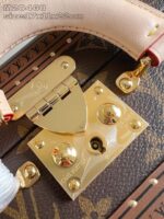 Borsa Louis Vuitton di lusso con hardware in oro e dettagli in pelle rosa raffinata.