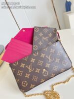 Borsa Louis Vuitton Monogram con cartelle rosa vibrante e tracolla in oro.
