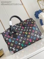 Borsa Louis Vuitton multicolore monogramma elegante con manici in pelle nera e dettagli di qualità.