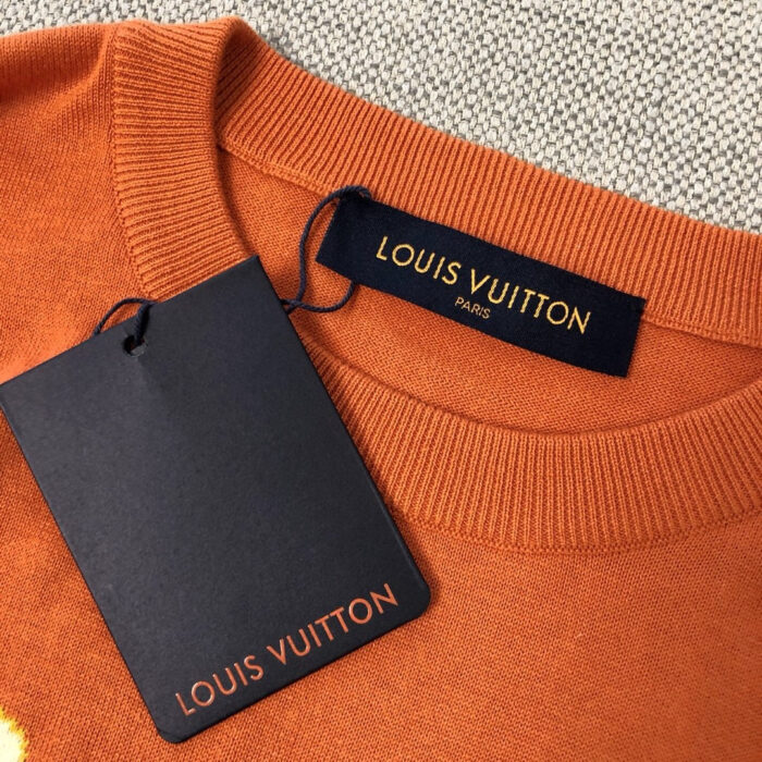 Maglione arancione Louis Vuitton di lusso, stile elegante e qualità premium.