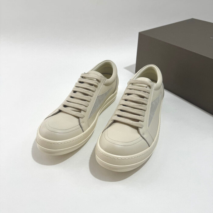 Sneakers eleganti crema, stile minimalista, comfort, dettagli raffinati, ideale per look sofisticati.