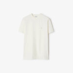 T-shirt beige minimalista con ricamo sul cuore, perfetta per look casual ed eleganti.