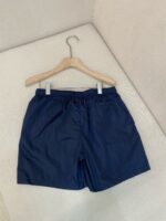 Shorts uomo in nylon navy blue, pratici e versatili per sport e casual.