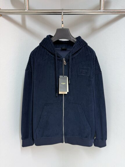 Felpa blu navy in corduroy con cerniera, tasche e cappuccio, perfetta per uno stile casual.