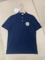 Maglietta polo blu navy con logo animale, stile casual e elegante, ideale per ogni occasione.