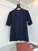 Maglietta navy blue casual e elegante in cotone, stile semplice e versatile.