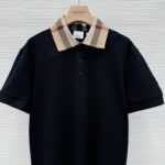 Polo navy con colletto tartan elegante, stile versatile per ogni occasione casual e raffinata.