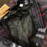 Giacca a quadri con fodera in mesh, stile casual e comfort ottimale.