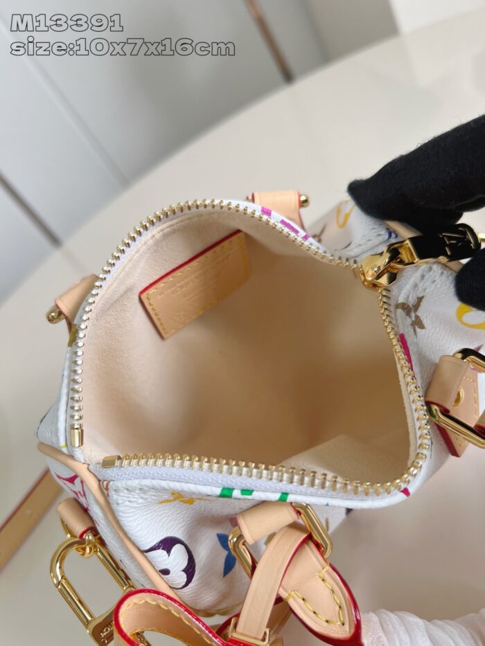 Borsa in canvas colorata con motivi giocosi e chiusura a zip resistente.