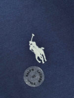 Maglietta polo Ralph Lauren navy con logo polo bianco e etichetta S, stile elegante e di qualità.