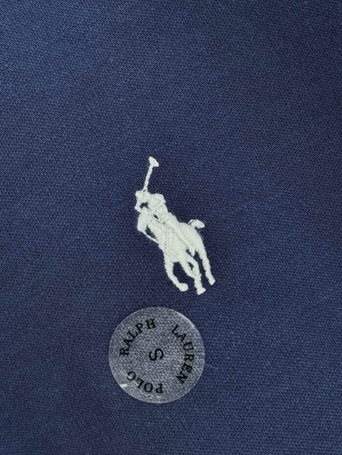 Maglietta polo Ralph Lauren navy con logo polo bianco e etichetta S, stile elegante e di qualità.