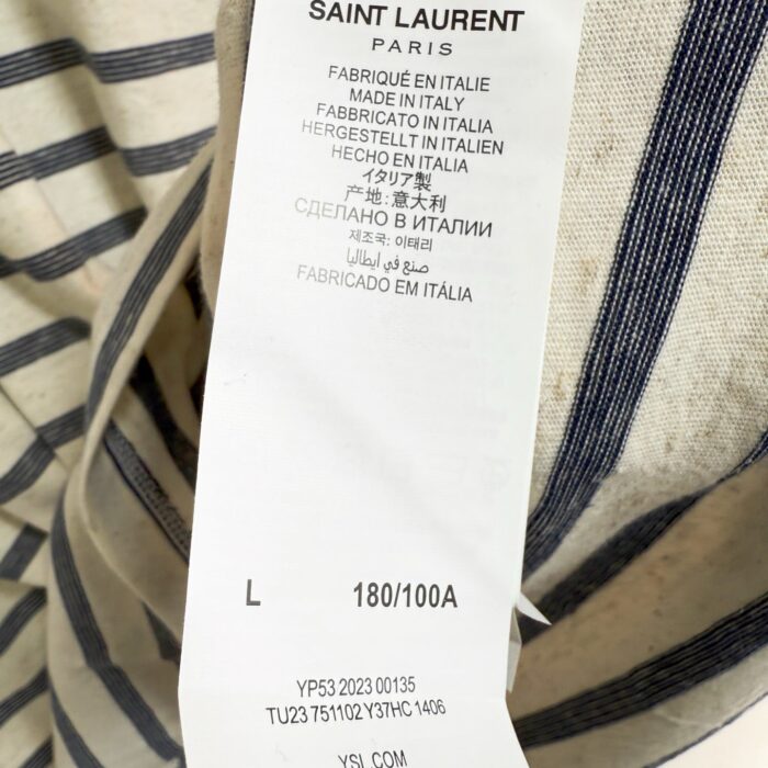 Etichetta Saint Laurent Italia, made in Italy, taglia L, dettagli di qualità e lusso.