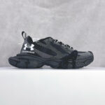 Scarpe sportive di lusso Under Armour e Balenciaga, nero-grigio, design moderno e comfort elevato.