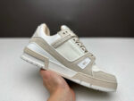 Sneaker beige elegante in pelle, stile moderno, comfort elevato e design versatile per ogni occasione.