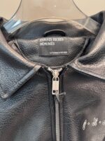 Giacca in pelle nera di alta qualità, con zip e etichetta di lusso ENFANTS RICHES DÉPRIMÉS.