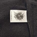 Etichetta KingsSpider con logo Web ragnatela su tessuto caldo e resistente.