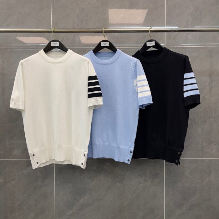 Maglioni a manica corta in vari colori, stile moderno e versatile, perfetti per ogni outfit.