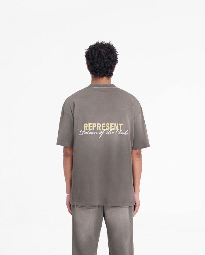 Abbigliamento streetwear casual con testo REPRESENT e Shadows of the Creek, stile urbano e moderno