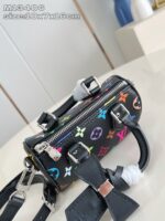 Borsa cilindrica di lusso colorata con manici e tracolla, stile moderno ed elegante.