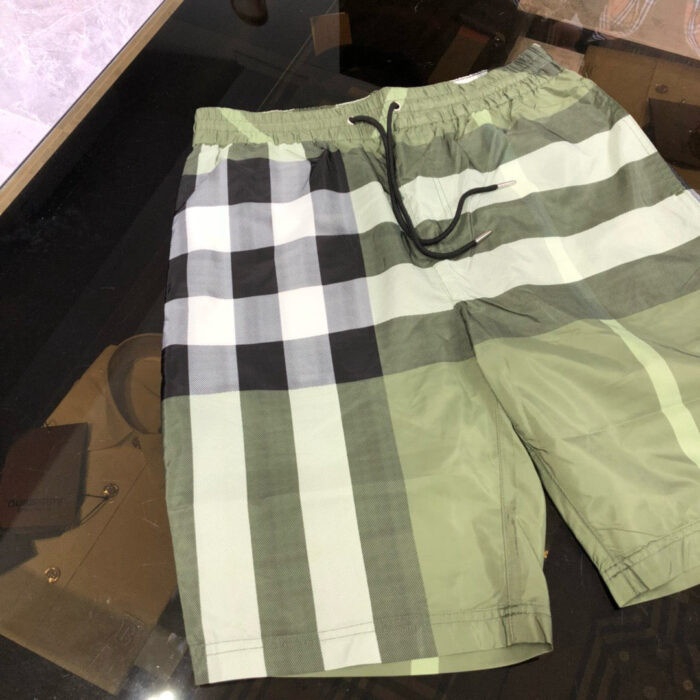 Shorts estivi checkered verde casuali uomo donna con elastico e tasche comode.
