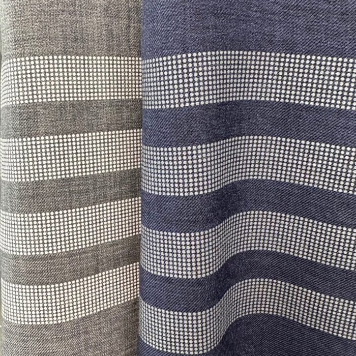 Tessuti a righe grigio e blu navy, eleganti e versatili per moda e decorazione.