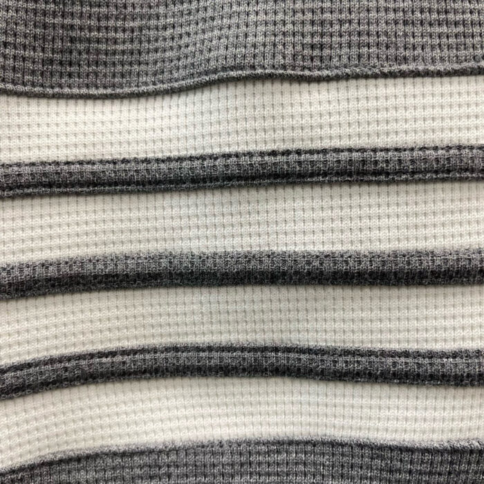 Tessuto a righe grigie e bianche, tessuto a coste morbido e elegante per abbigliamento casual.