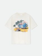 T-shirt casual con graphic spiaggia tropicale, casa, palme e mare, perfetta per l’estate.