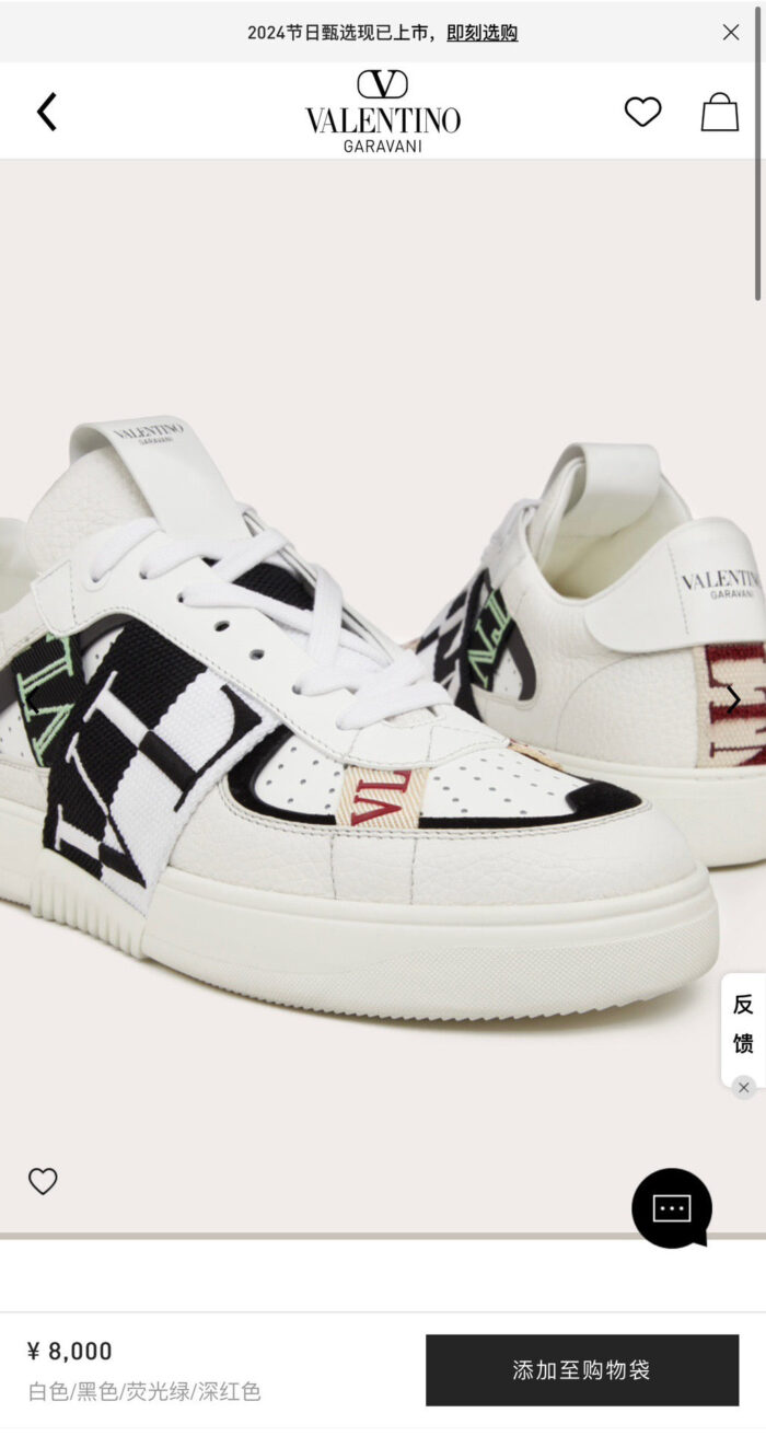 Sneaker Valentino moderna con dettagli colorati, pattern checkered e design asimmetrico trendy.