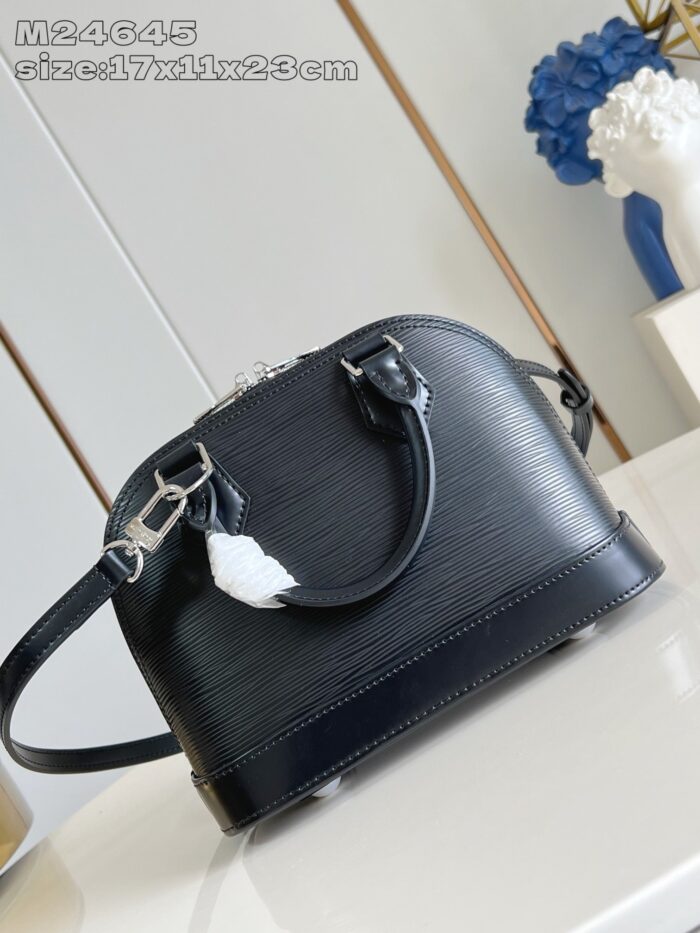 Borsa nera elegante con manici in argento e tracolla rimovibile, stile classico e versatile.